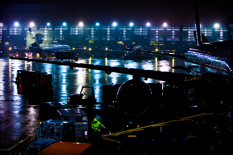 Baggage Handler in Storm : Chicago O'Hare Airport : Chicago Illinois