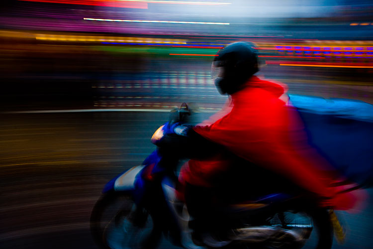 Biker in the Rain and Gloom of a London Afternoon : Camden : London