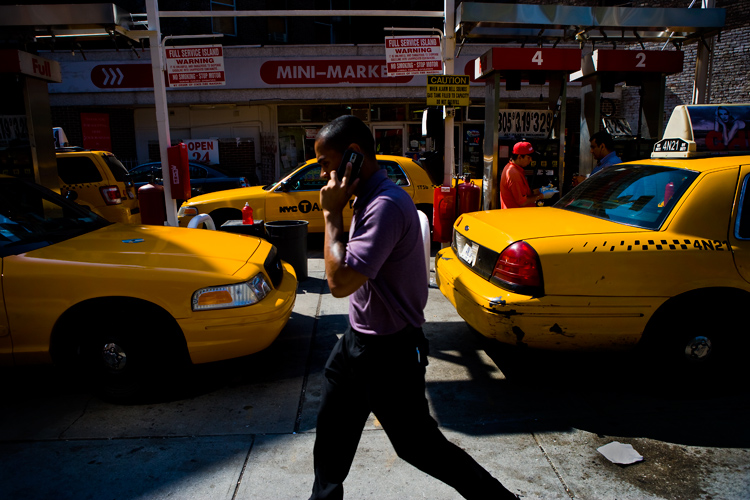 Phone Walker At Gas Station : West Village : NYC