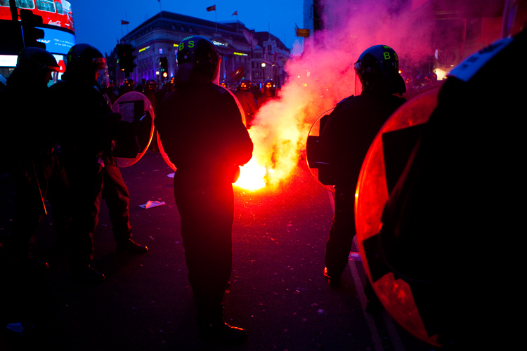 Red Fire : Anti-Cuts Protest Piccadilly  : Central London UK