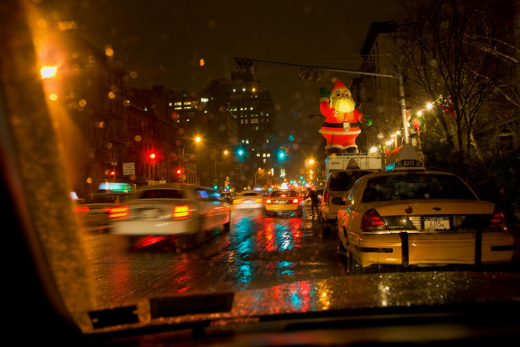Twenty Foot Blow-Up Santa Survives the Wind, Sleet and Snow of a Nor'easter Storm : 3AM Saturday Night,  9th Av at 20th St : NYC