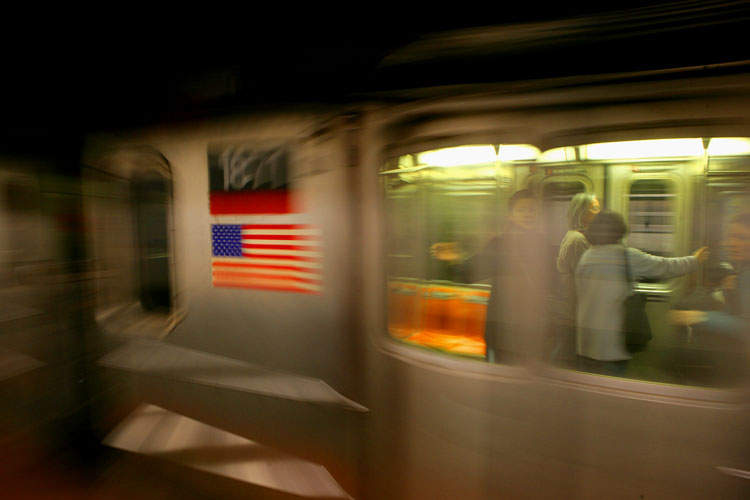 Riders and Flag : Passing Subway Car : C train 23rd St NYC
